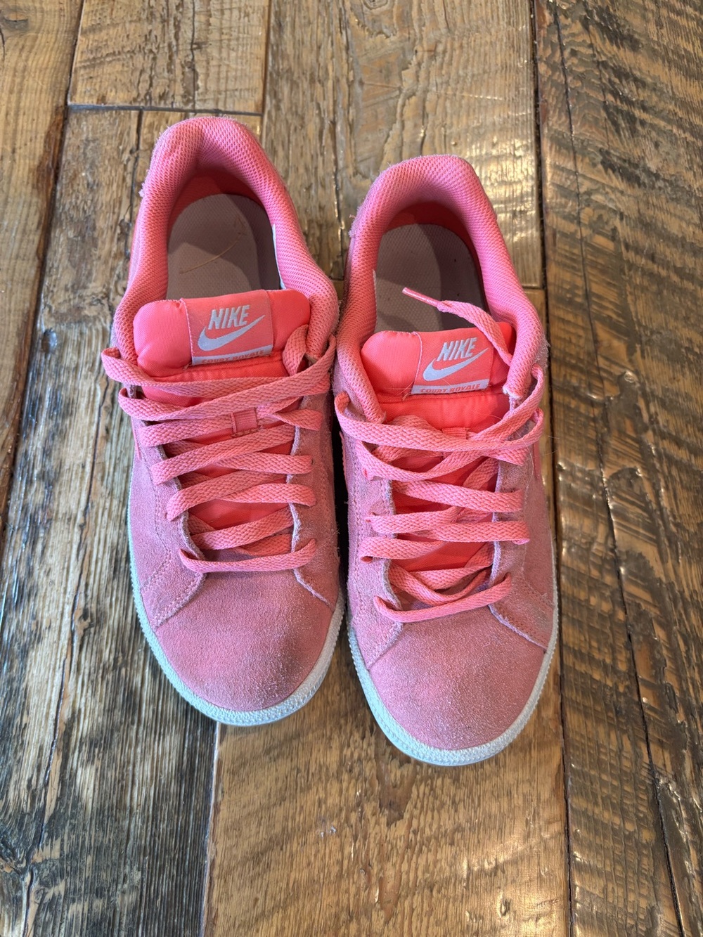Nike women’s Pink Suede Low-Top Sneakers. 9